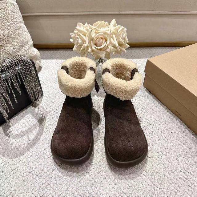 Ugg Women's Upgraded Platform Wool Boots are a must-have! The epitome of effortl