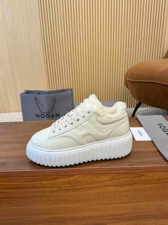 Hogan's newest style at an amazing price! Unisex, stylish round toe, genuine lea