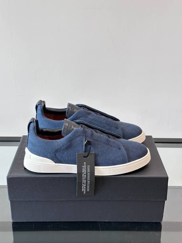 Zegna's new men's low-top leather sneakers, crafted from imported cowhide, featu