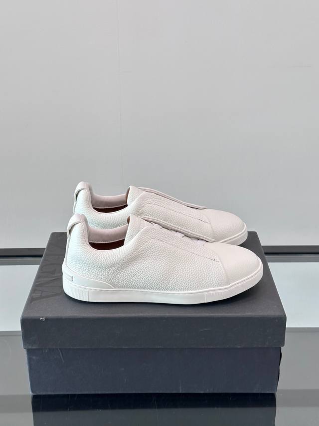 Zegna's new men's low-top leather sneakers, crafted from imported cowhide, featu