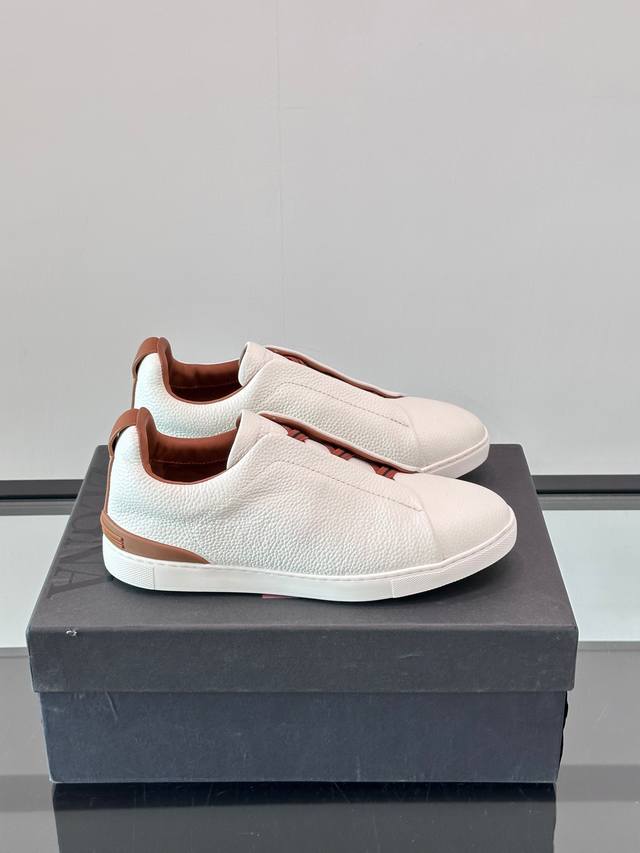 Zegna's new men's low-top leather sneakers, crafted from imported cowhide, featu