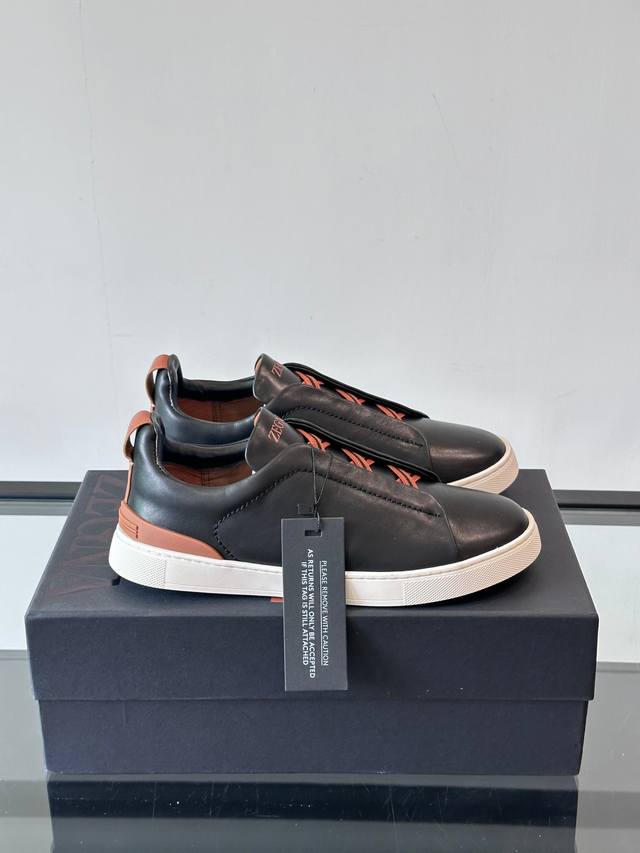Zegna 's new men's low-top leather sneakers, crafted from imported cowhide, feat