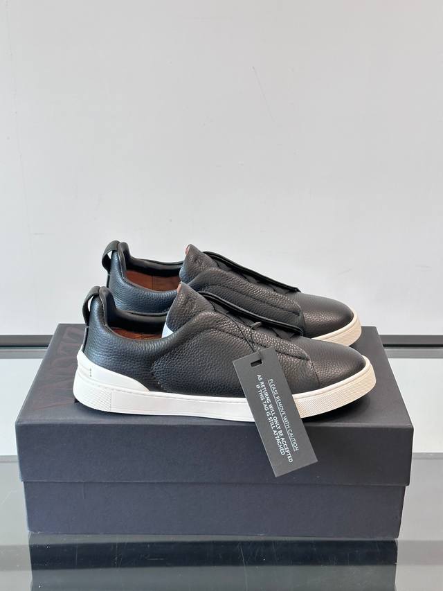 Zegna's new men's low-top leather sneakers, crafted from imported cowhide, featu