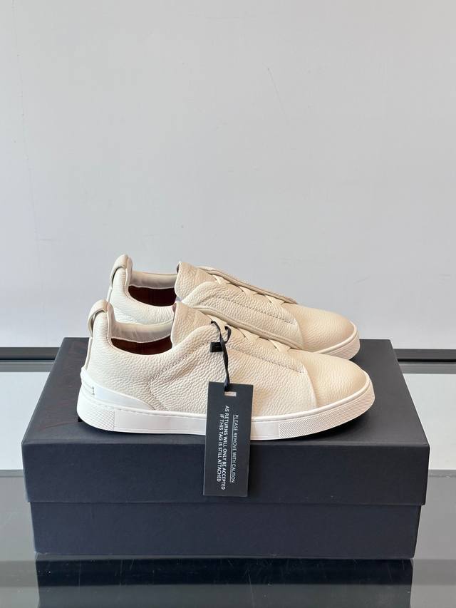 Zegna's new men's low-top leather sneakers, crafted from imported cowhide, featu