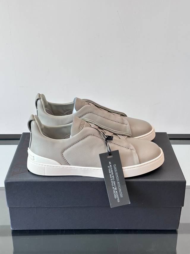 Zegna's new men's low-top leather sneakers, crafted from imported cowhide, featu