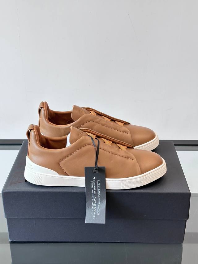 Zegna's new men's low-top leather sneakers, crafted from imported cowhide, featu