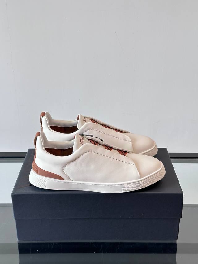 Zegna's new men's low-top leather sneakers, crafted from imported cowhide, featu