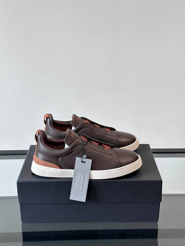 Zegna's new men's low-top leather sneakers, crafted from imported cowhide, featu