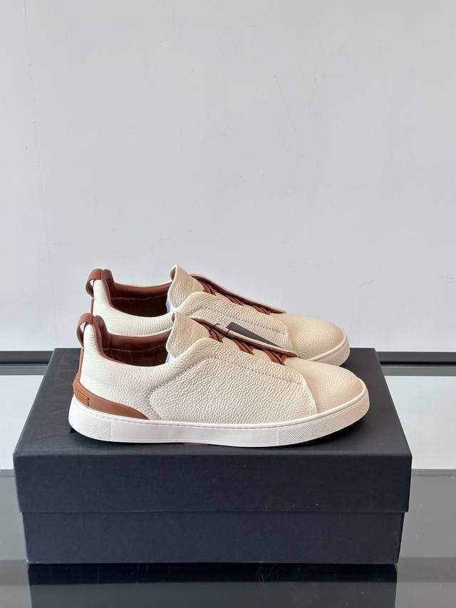 Zegna's new men's low-top leather sneakers, crafted from imported cowhide, featu