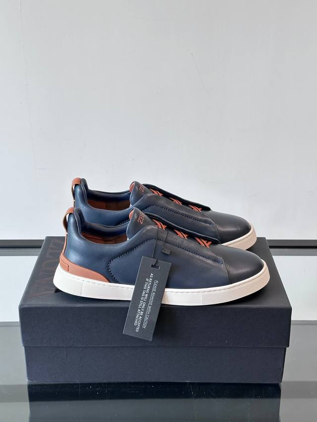 Zegna's new men's low-top leather sneakers, crafted from imported cowhide, featu