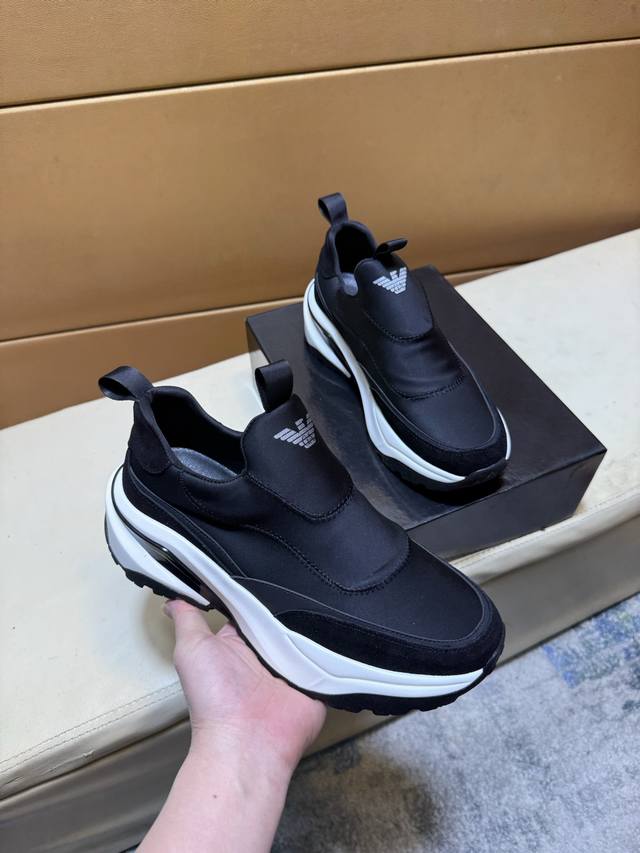 Exclusive first release of Armani's unique modern style sneakers. Casual Italian