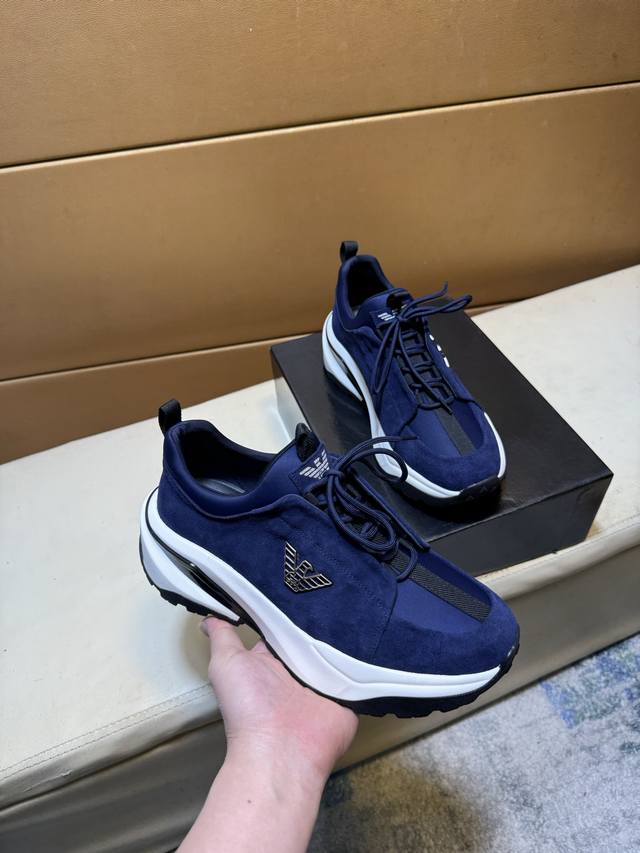Exclusive first release of Armani's unique modern style sneakers. Casual Italian
