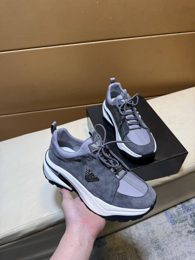 Exclusive first release of Armani's unique modern style sneakers. Casual Italian
