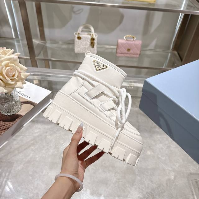 Factory Price (pp): Latest Prada Snow Boots Enameled Triangular Metal Logo Boot