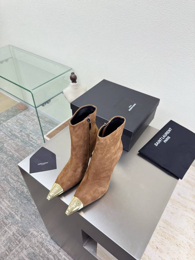 Must-have for long legs: YSL high-heeled ankle boots with metallic toe. Made wi