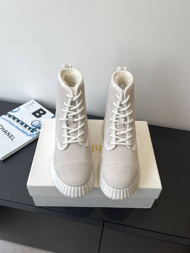 Chloe's new snow boots are now available at boutiques! Made with imported cow su