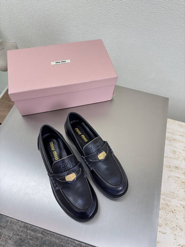 Gold Coin Series Miu'miu Loafers Black distressed cowhide with oiled edges Flat