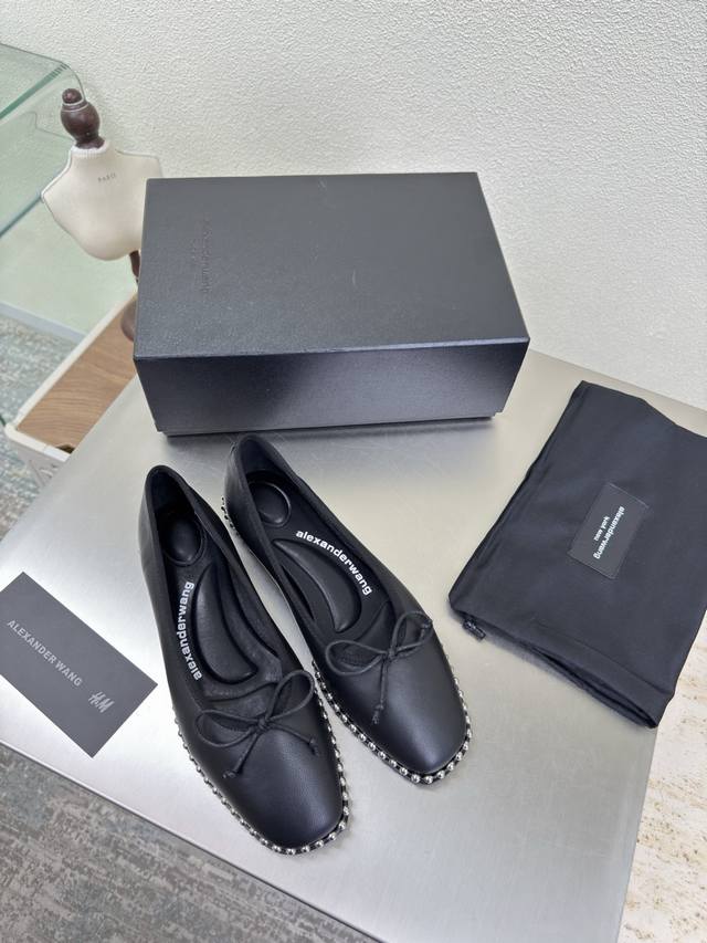 Flat shoes with a stylish design by Alexander Wags. Black lambskin. Simple desi
