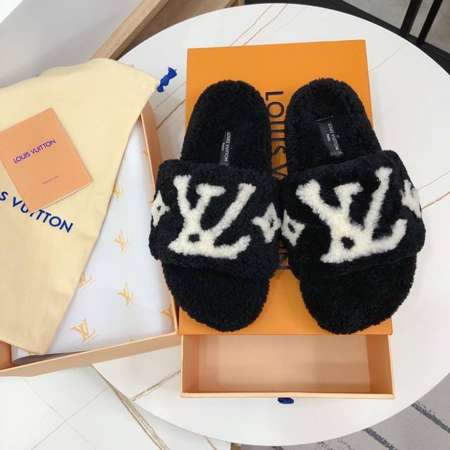 Lv~~Wool Slippers, a super popular fluffy slipper. Made with pure wool and incor