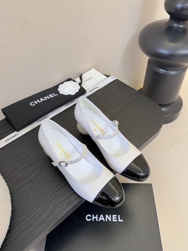 Chane* Creative Pearl Heel Mary Jane Shoes The heel features the iconic double-C
