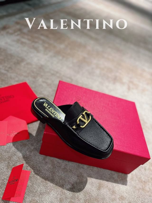 Valentino. Latest Valentino collection shoes with V-shaped studs and metal buckl