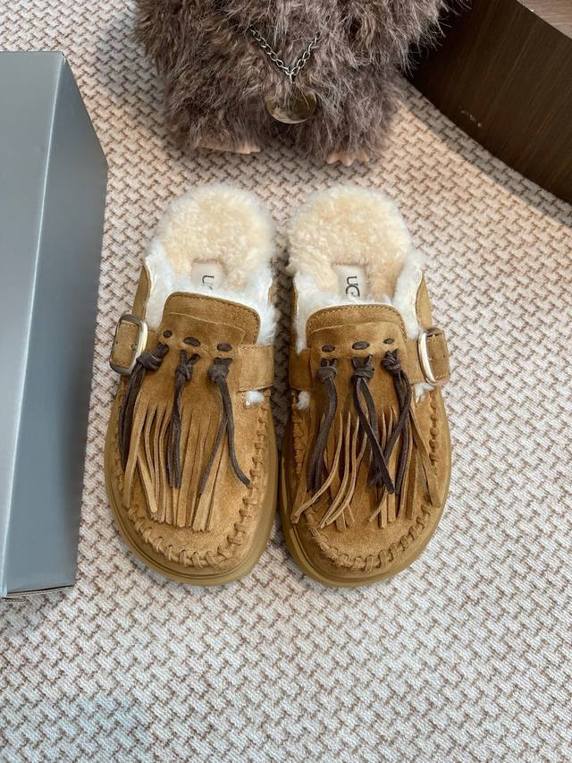 Ugg tassel mules, this pair is made entirely from authentic materials, featuring