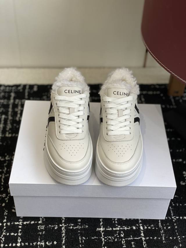Retail-grade Celine Runner sneakers with Celine logo on the tongue and heel. Thi