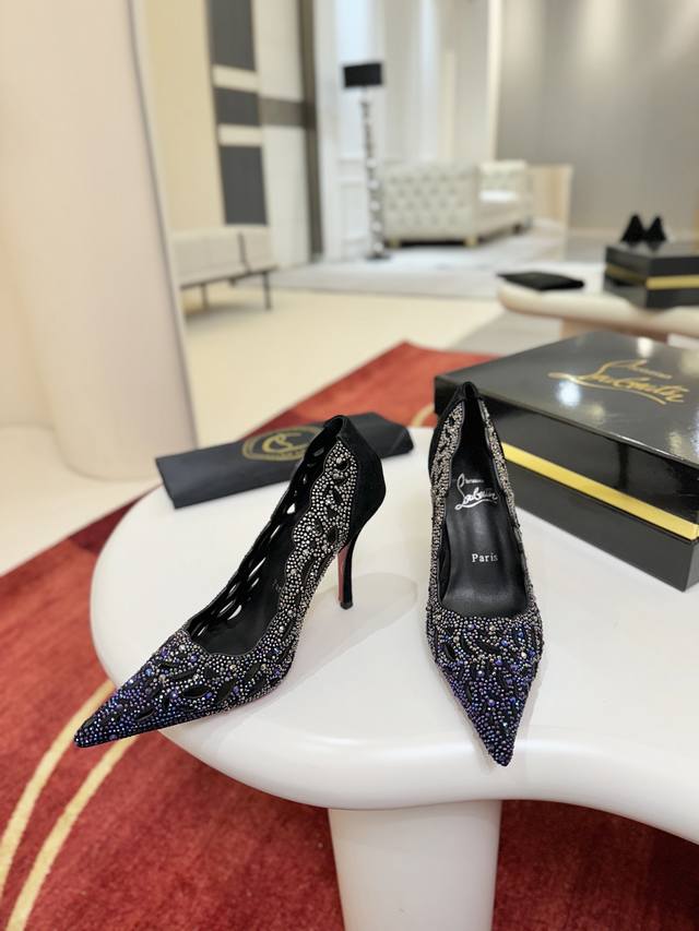 Openwork Rhinestone Shoes W. This Maison Christian Louboutin shoe features a 10