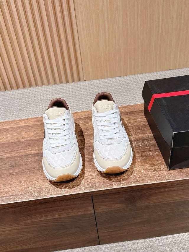 Prada New Men's Platform Leather Patchwork Sneakers. These leather sneakers fea