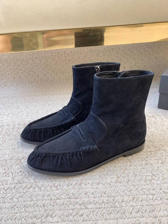 Saint Lauren* YSL Retro Pleated Loafer Ankle Boots. The mule toe design and mocc