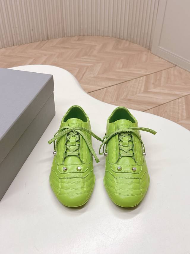 Balenciaga City Sneaker. The shoe features a soft, contoured silhouette paired w