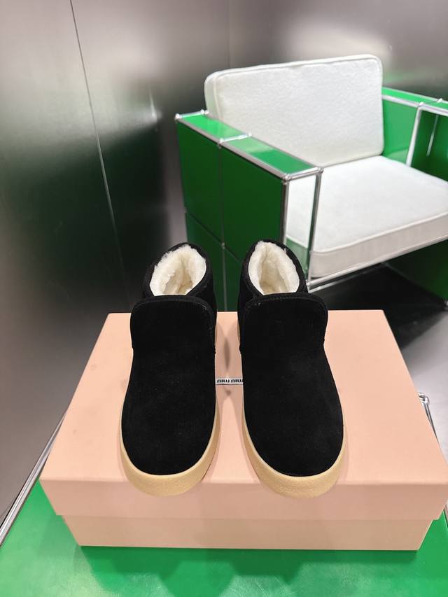 K018 Miu Miu Suede and Shearling Ankle Boots The soft, lightweight texture defin