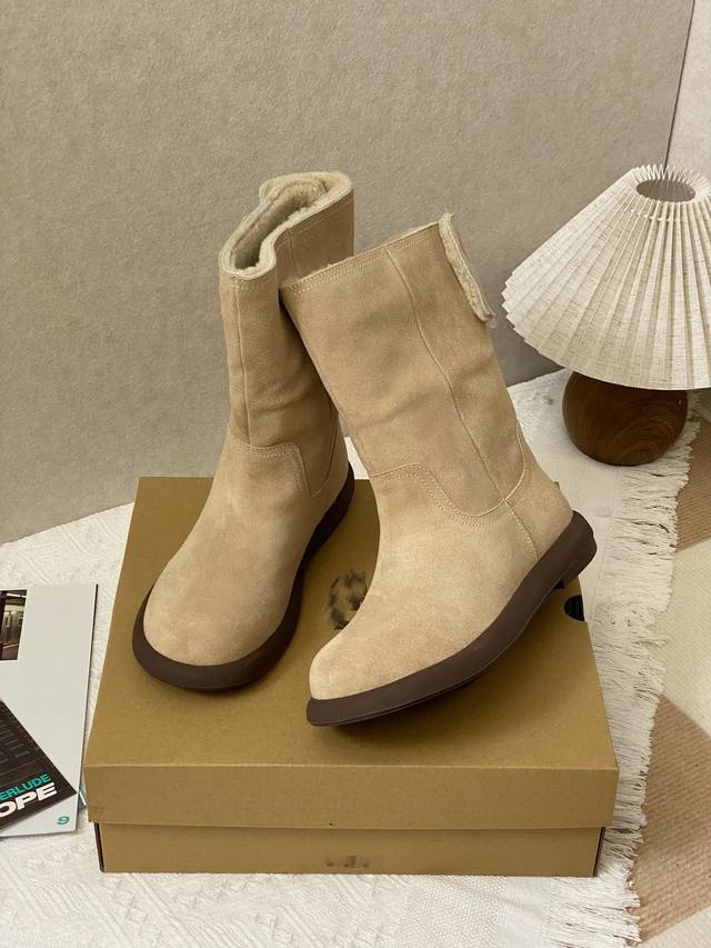 Exquisite Craftsmanship: High-top boot style with a 3D patchwork upper; delicat