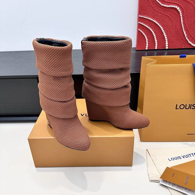 These Louis Vuitton wedge knit boots are so soft! The slouch ankle boot style wi