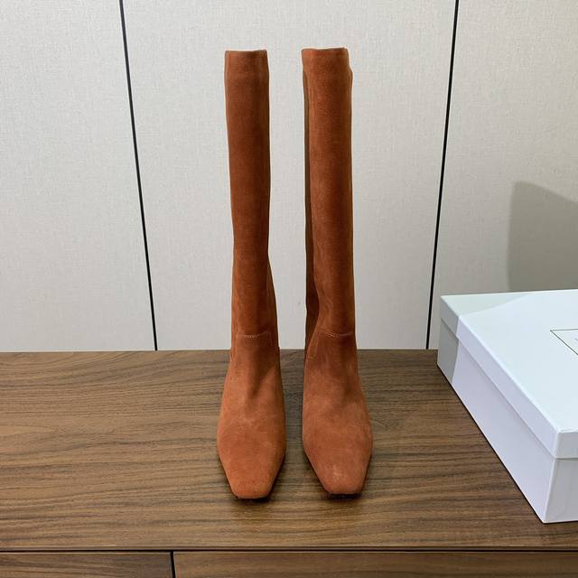 Khaite Long Boots. Elegant style, creating a unique feel, simple and sophisticat