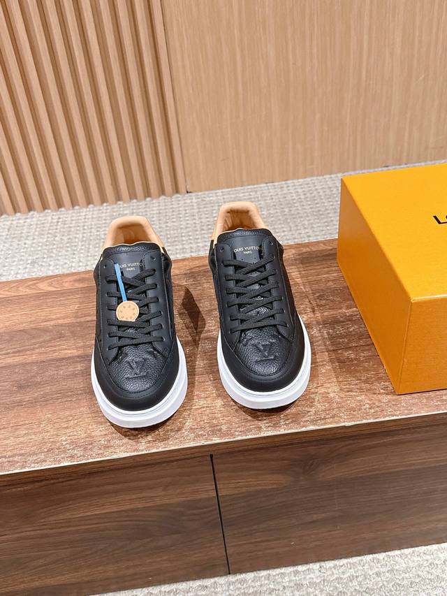 Louis Vuitton Men's Casual Sneakers. These sneakers feature a soft grained cowh