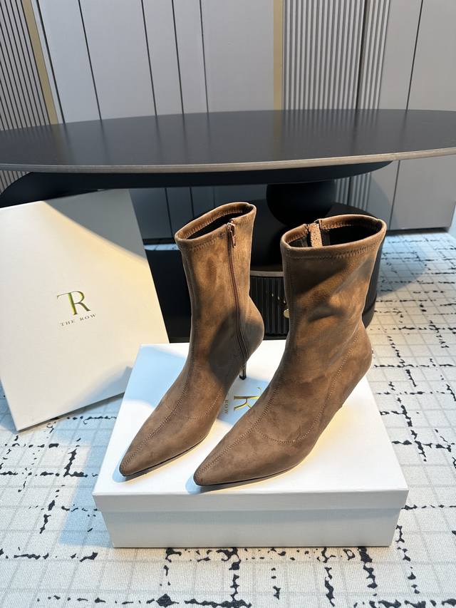 The Row New High-Heeled Pointed-Toe Ankle Boots Made of a suede-like material wi