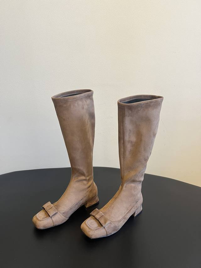 The Row 25Ss Retro Bow-Tie Knee Boots Continuing the brand's "minimalist luxury"