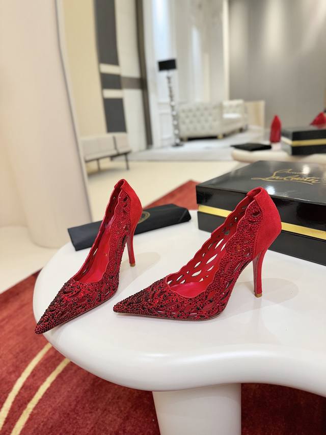 Openwork Rhinestone Shoes W. This Maison Christian Louboutin shoe features a 10