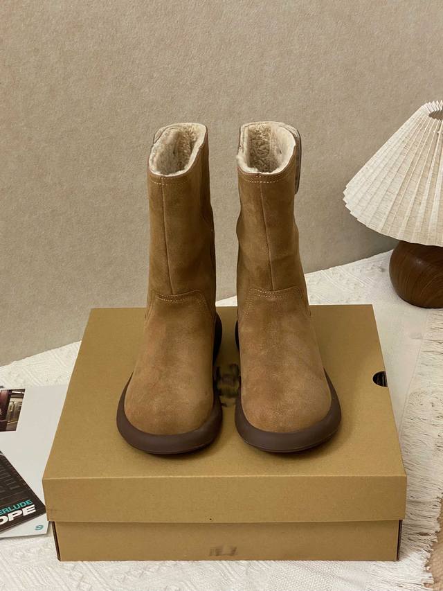 Exquisite Craftsmanship: High-top boot style with a 3D patchwork upper; delicat