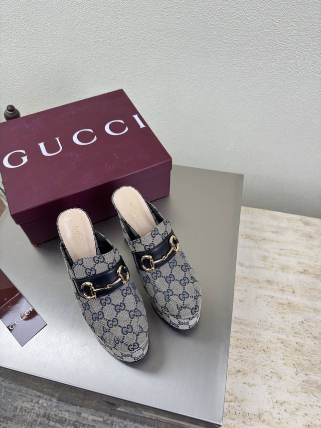 Gucci platform sandals with a 13cm heel and 4.5cm platform. Blue monogram print
