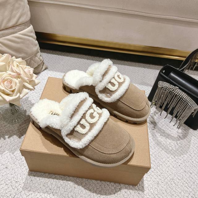 Sand-colored Ugg Logo Slippers are so popular! The chubby, round toe shoes with