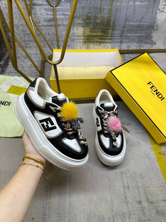 Fendi Match lace-up sneakers. Black and white leather with black leather Ff appl