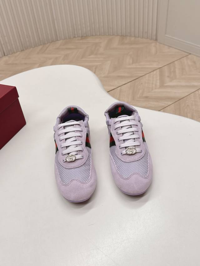 Gucci Shift New Retro German Training Sneakers. The classic red and green webbi