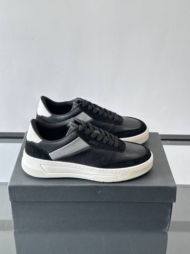 Boss casual sneakers, made with genuine leather and suede, offering a delicate t