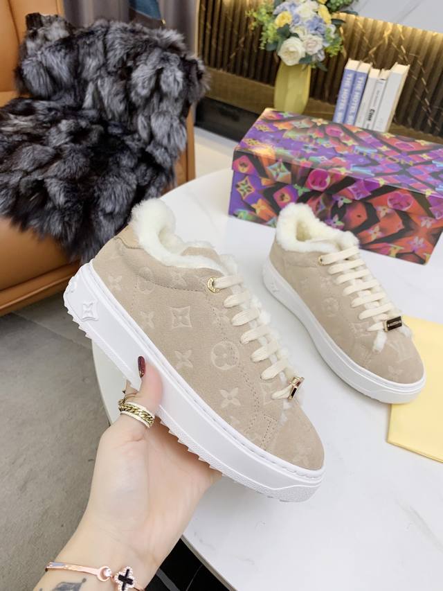 Lv This Time Out sneaker features suede embossed with the Monogram pattern made