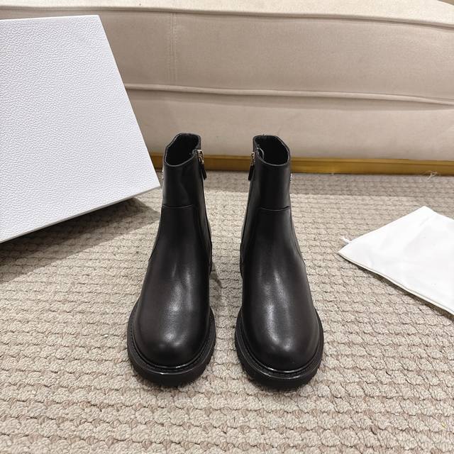 Retailer Level! The Dior D-Town ankle boots are a timeless style. The black brus