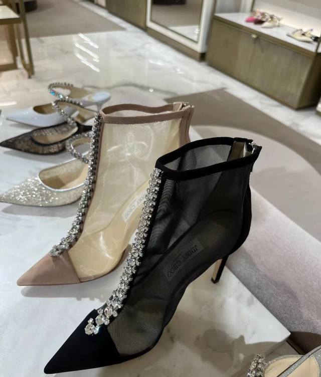 Jimmy Choo Fall/Winter Lace Rhinestone High-Heeled Boots. A must-have item for f