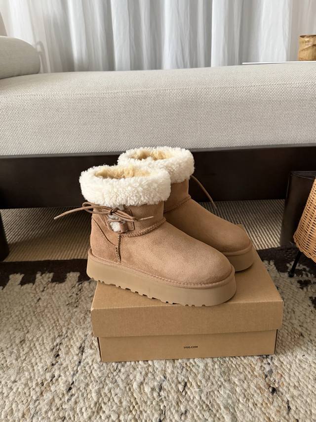 Ballet-style lace-up platform boots, low-cut. Adorably cute with teddy bear curl