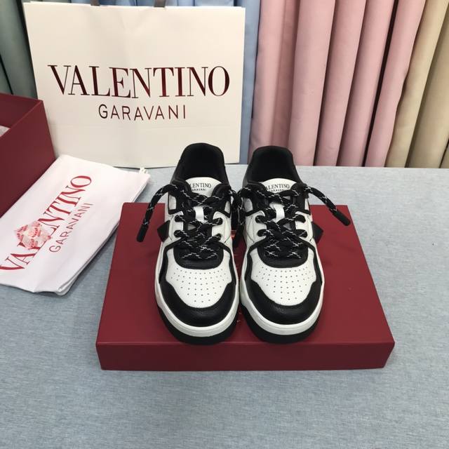 Top-tier Valentino platform sneakers, latest fashion week runway couple style,